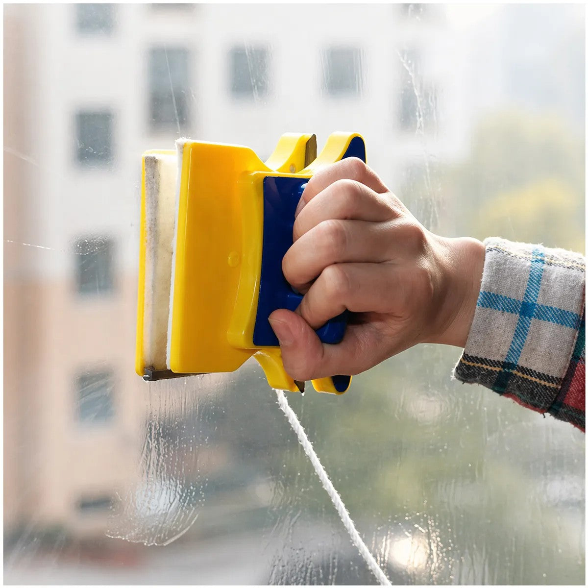 Limpiador magnetico para vidrios
