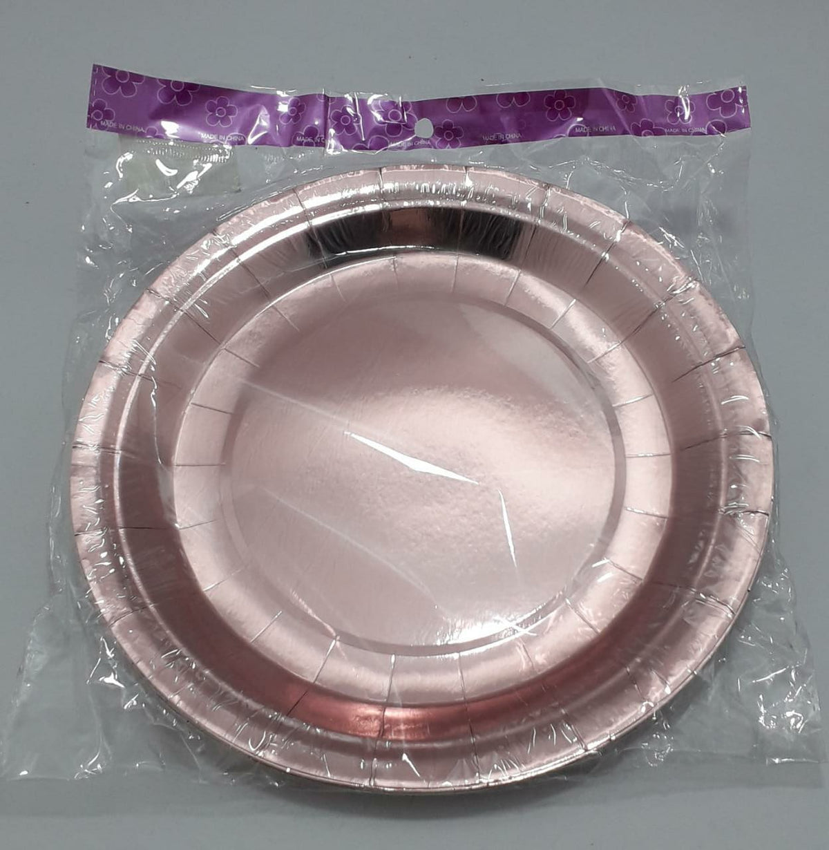 Plato metalizado oro rosa en bolsa 23 c