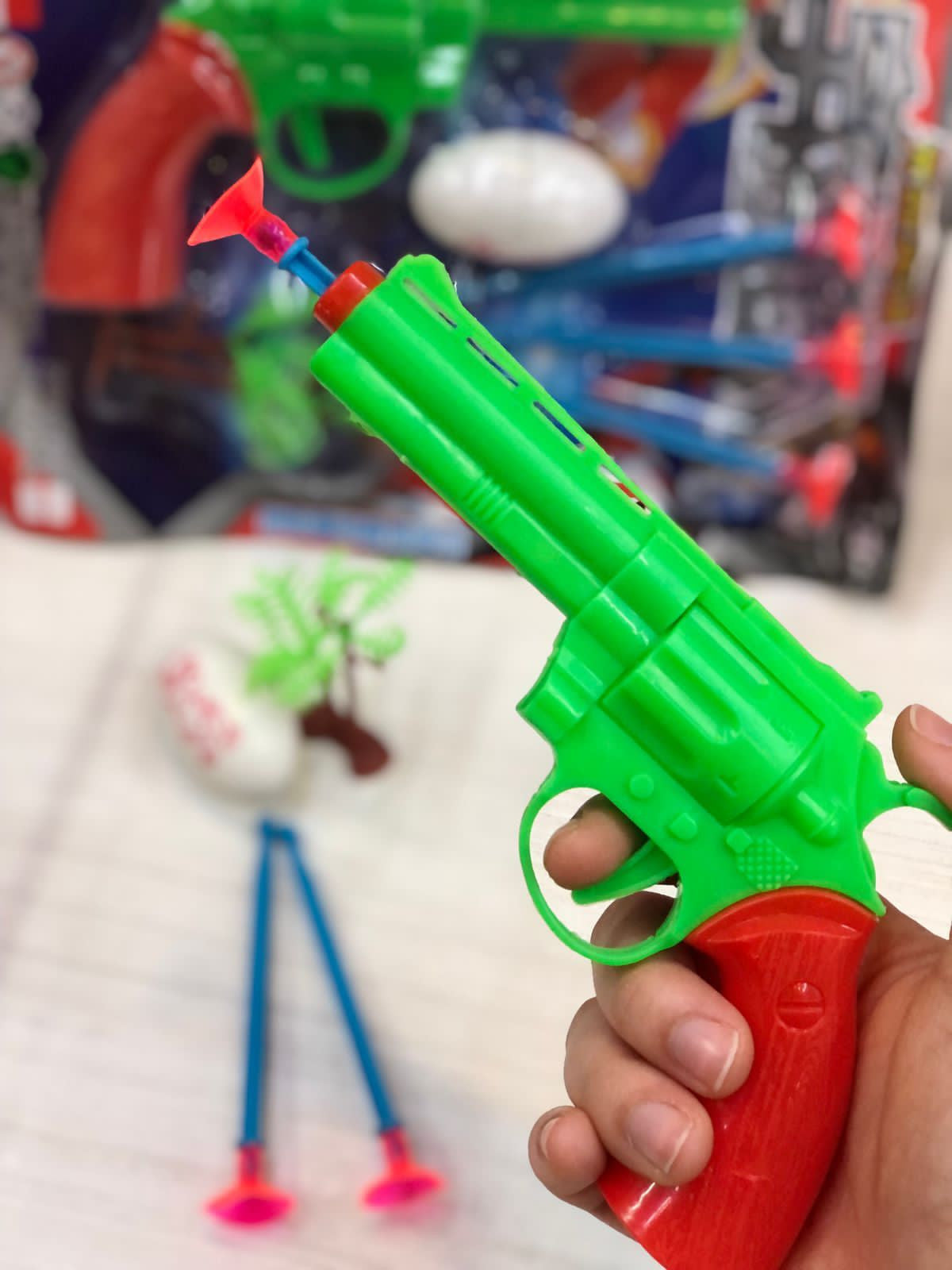 Juguete de dardos estilo dinosaurio en b