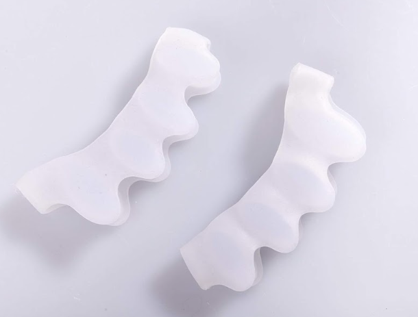 Separador de dedos blanco
