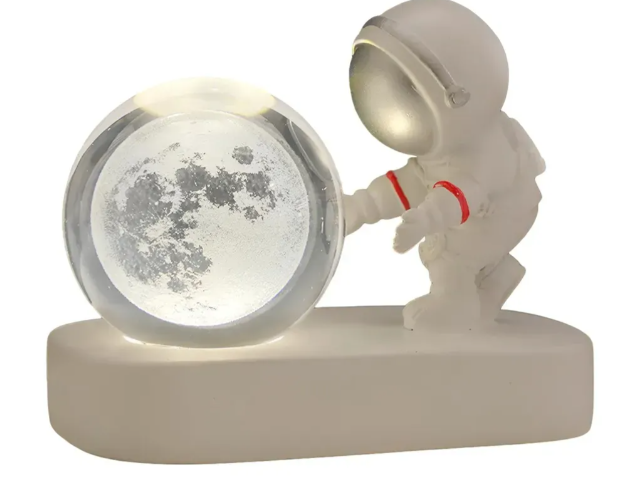 Esfera iluminada astronauta